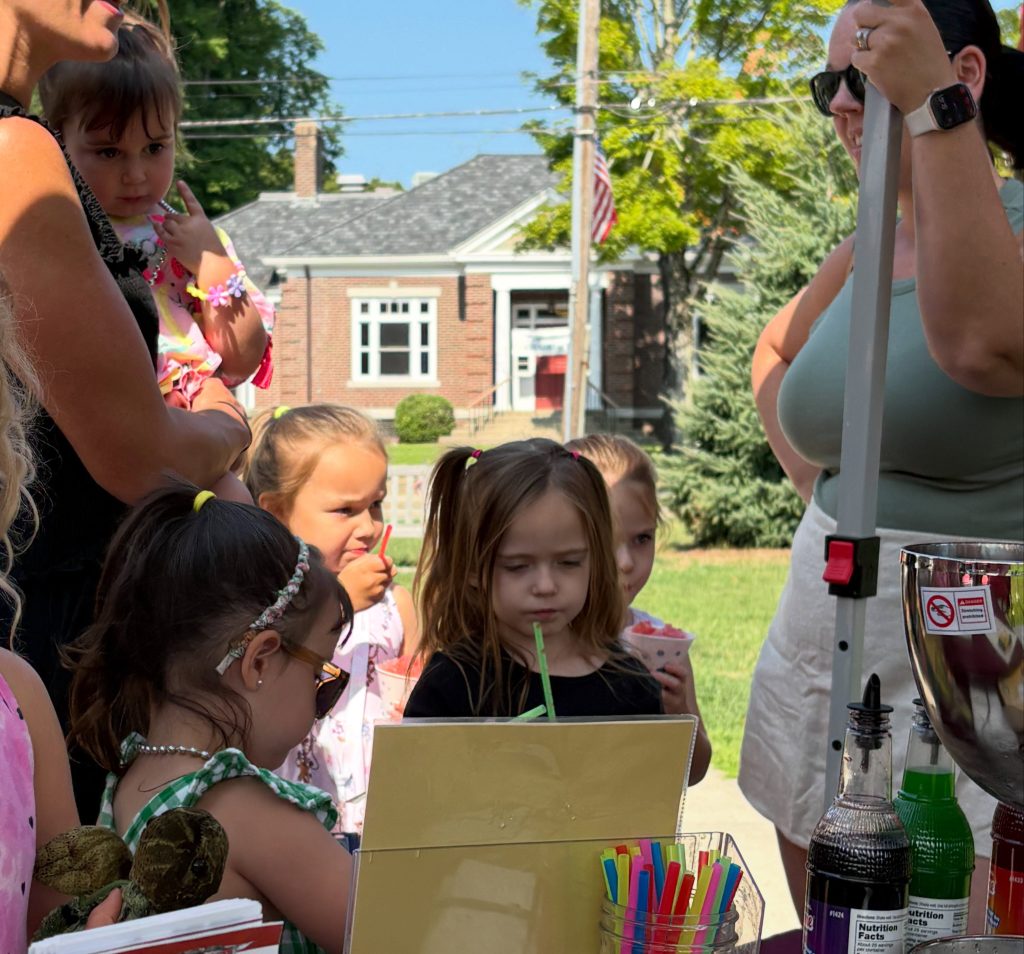 Young visitors enjoy their tasty snow cones